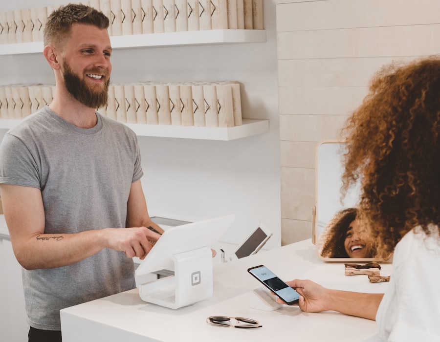 A customer paying with their phone